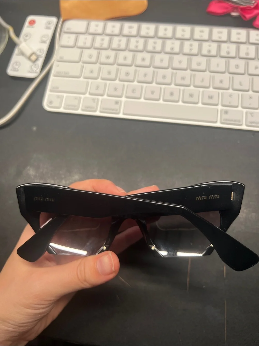 Miu Miu Black Cat-Eye Sunglasses with Gradient Lenses